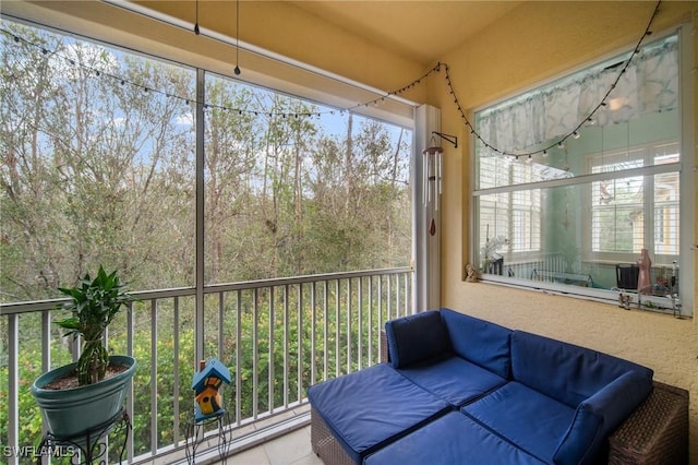 sunroom / solarium featuring plenty of natural light