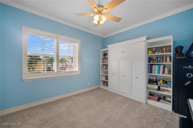 unfurnished bedroom featuring crown molding, ceiling fan, and light carpet