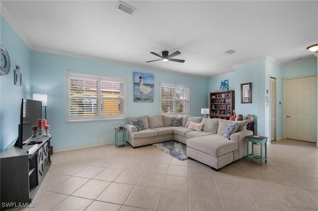 living room with ceiling fan, light tile patterned floors, and ornamental molding