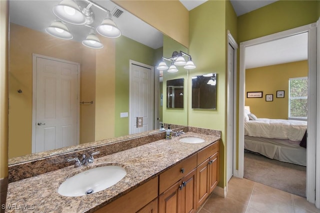 bathroom featuring vanity and tile patterned floors