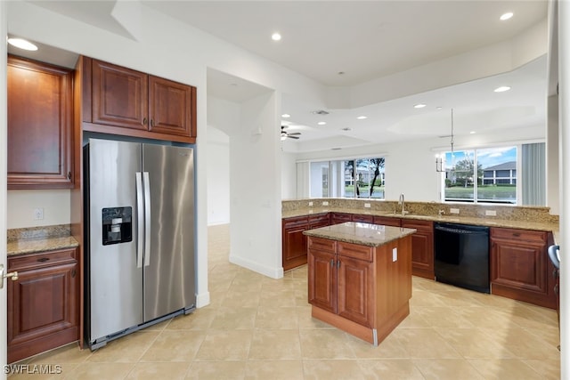 kitchen with dishwasher, a kitchen island, light stone counters, and stainless steel refrigerator with ice dispenser