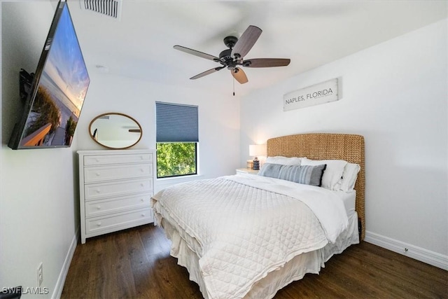 bedroom featuring ceiling fan and dark hardwood / wood-style flooring