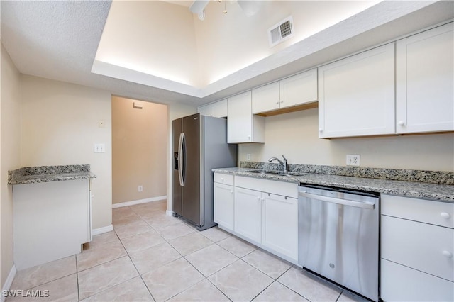 kitchen featuring white cabinetry, sink, and appliances with stainless steel finishes