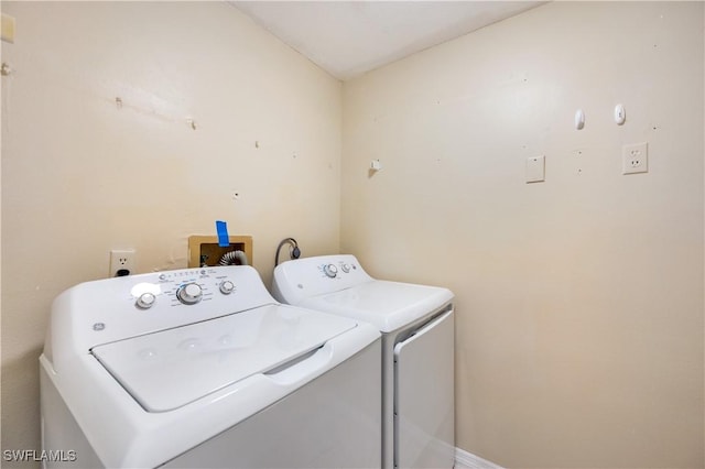 washroom with washer and clothes dryer