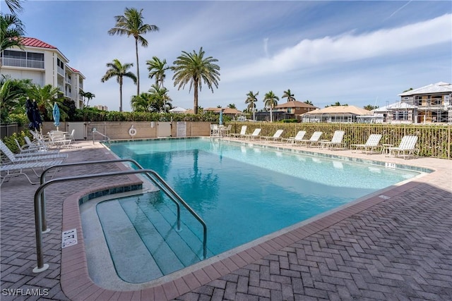 view of swimming pool with a patio area