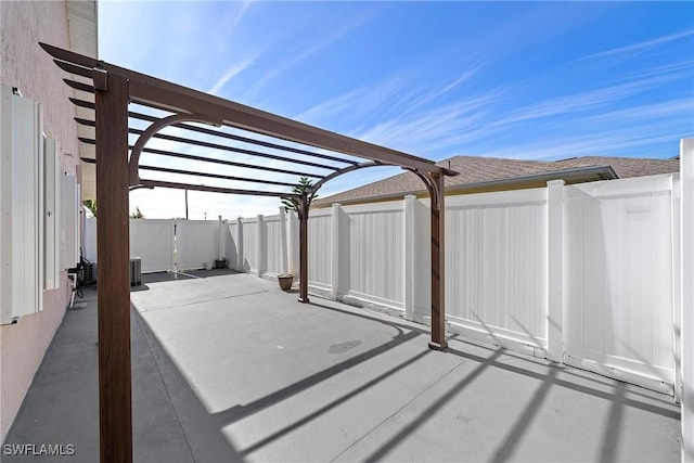 view of patio featuring a pergola