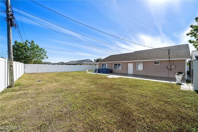 view of yard with a patio area