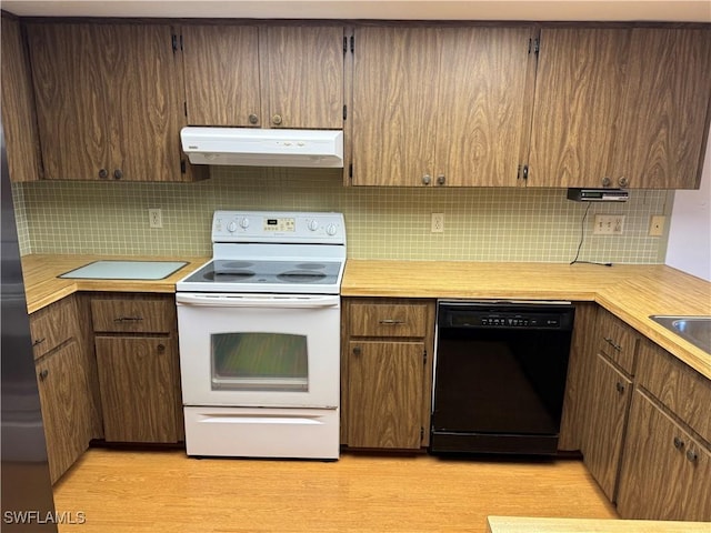 kitchen with black dishwasher, white electric range oven, light wood-type flooring, and decorative backsplash