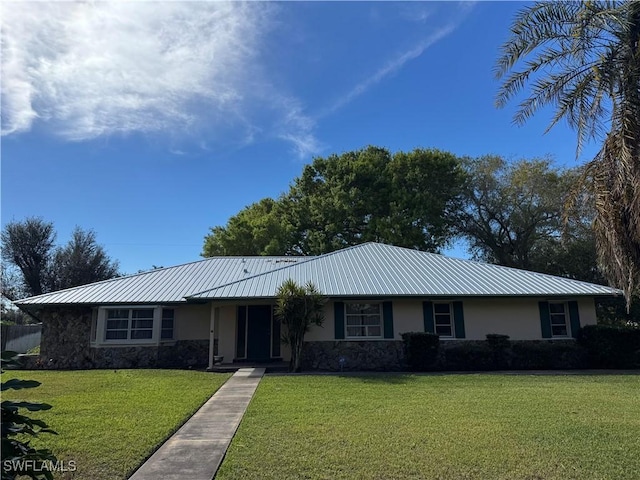 single story home with a front yard