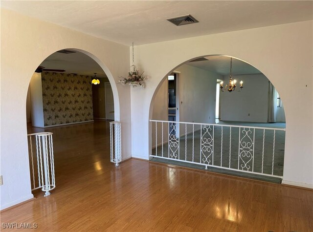 spare room featuring hardwood / wood-style flooring