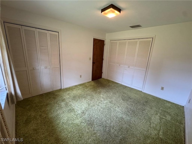 unfurnished bedroom featuring carpet