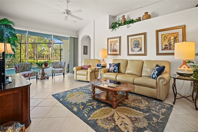 tiled living room featuring ceiling fan