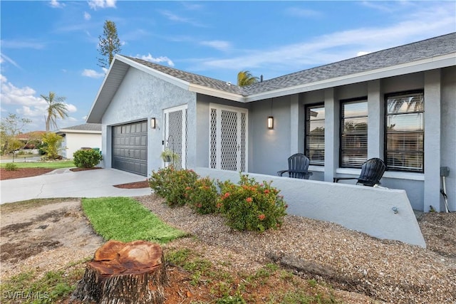 view of side of property featuring a garage