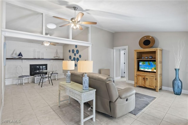 tiled living room with ceiling fan and lofted ceiling