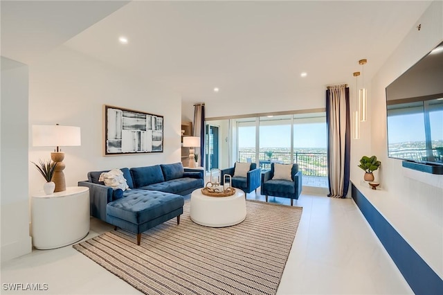 living room with floor to ceiling windows