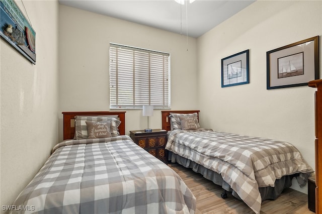 bedroom featuring hardwood / wood-style floors