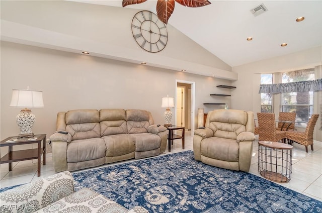 tiled living room with high vaulted ceiling