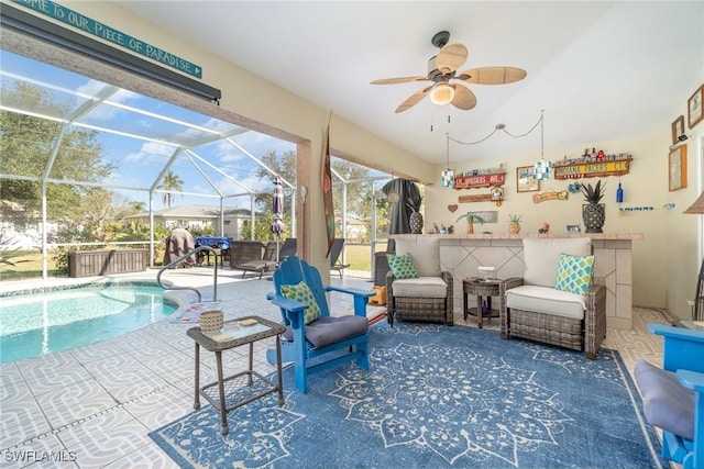 view of swimming pool featuring ceiling fan