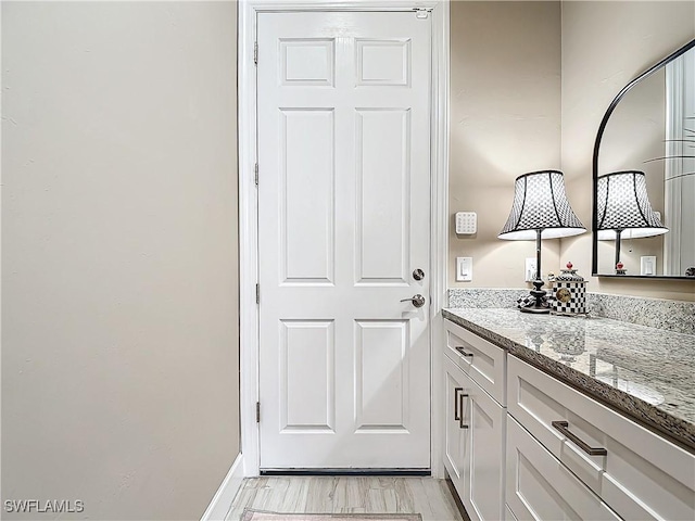 20462 Misty Woods Ct, Estero, FL 33928 - doorway with light wood finished floors