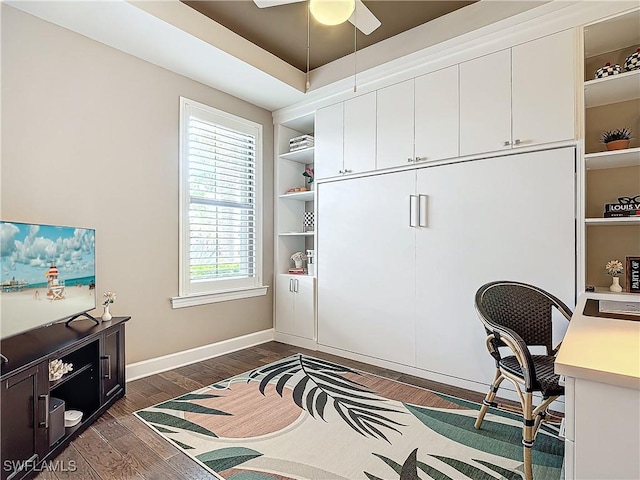 20462 Misty Woods Ct, Estero, FL 33928 - office area featuring dark wood-type flooring, a ceiling fan, baseboards, and built in features