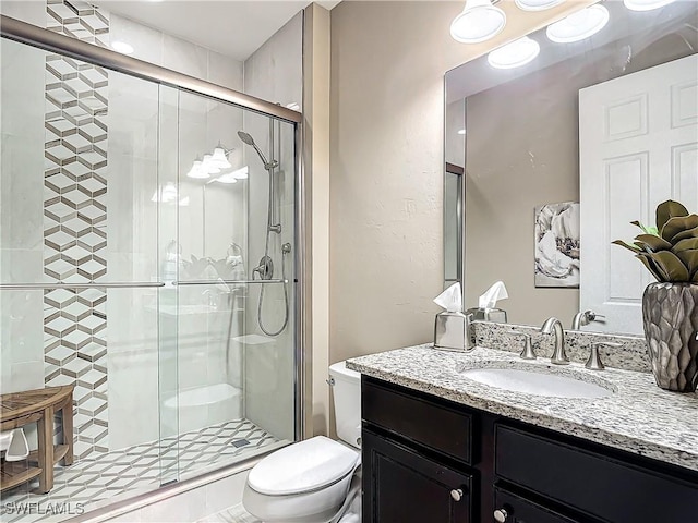 20462 Misty Woods Ct, Estero, FL 33928 - full bathroom with toilet, vanity, and a stall shower