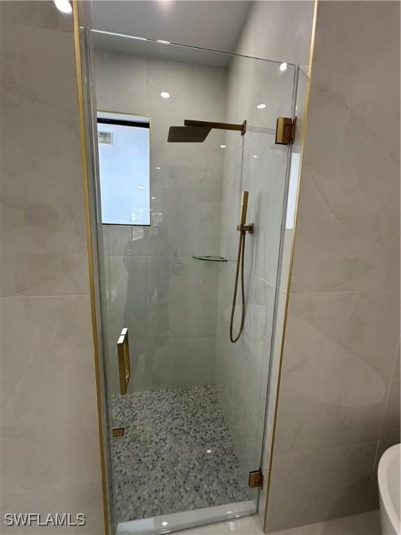 bathroom featuring walk in shower