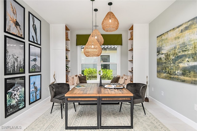 dining room with built in shelves