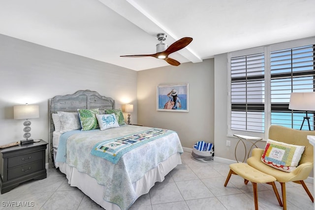 tiled bedroom with beamed ceiling and ceiling fan