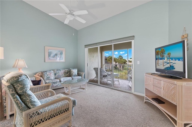 living room with ceiling fan, carpet floors, and high vaulted ceiling