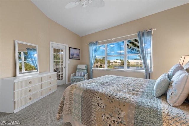 bedroom with carpet flooring, multiple windows, ceiling fan, and lofted ceiling