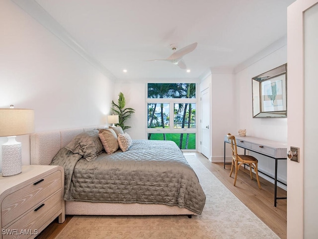 bedroom featuring crown molding, ceiling fan, access to exterior, and light wood-type flooring