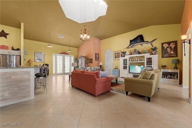 tiled living room featuring french doors, lofted ceiling, and a notable chandelier