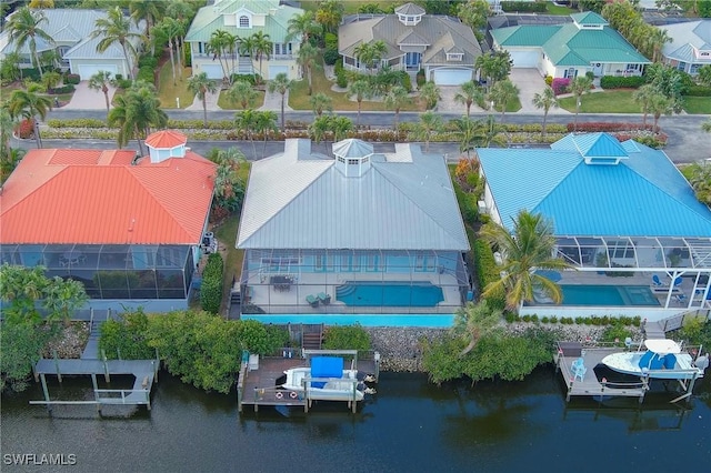 drone / aerial view featuring a water view