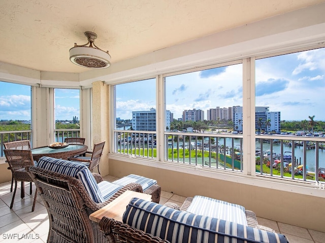 sunroom with a water view