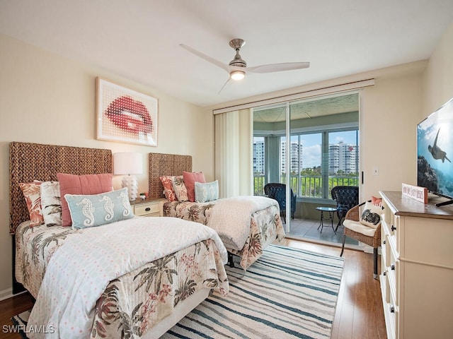 bedroom with access to exterior, light hardwood / wood-style floors, and ceiling fan