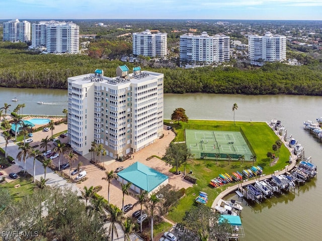 birds eye view of property with a water view