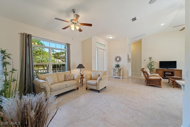 living room with ceiling fan