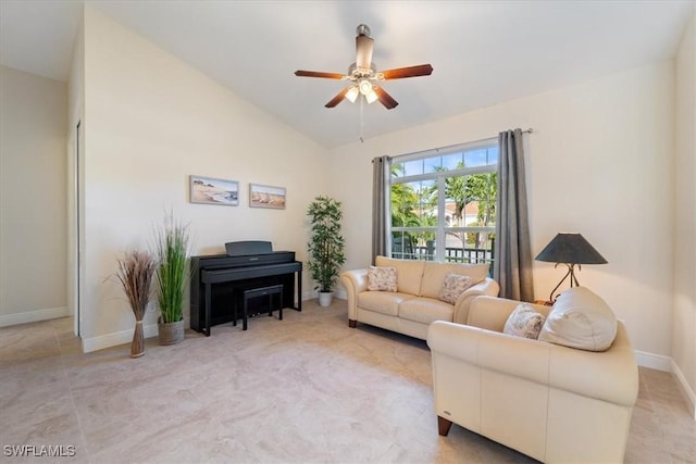 living room featuring ceiling fan and vaulted ceiling