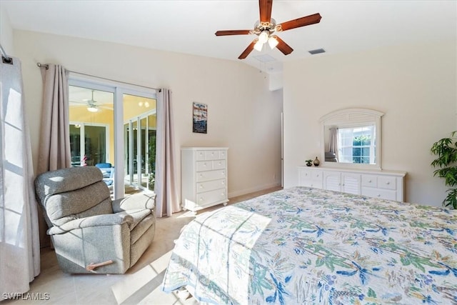 bedroom with ceiling fan, lofted ceiling, and access to outside