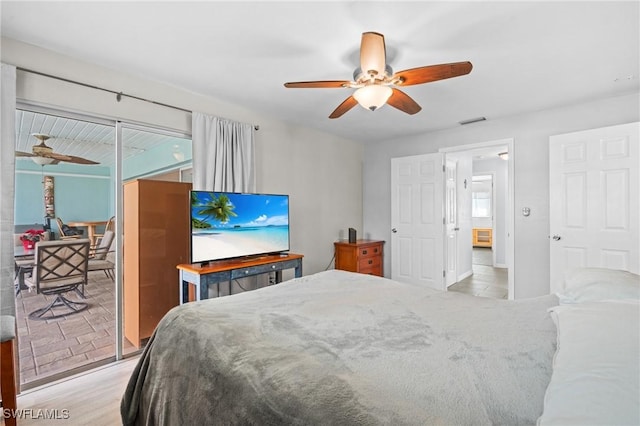 bedroom featuring ceiling fan and light wood-type flooring