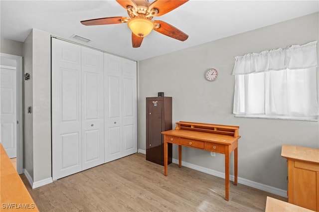 misc room featuring ceiling fan and light hardwood / wood-style flooring