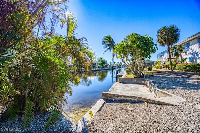 view of dock with a water view