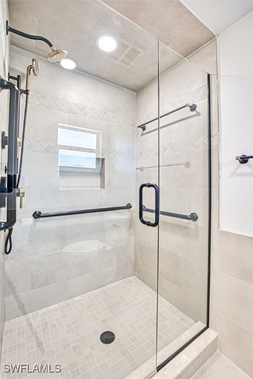 bathroom featuring walk in shower