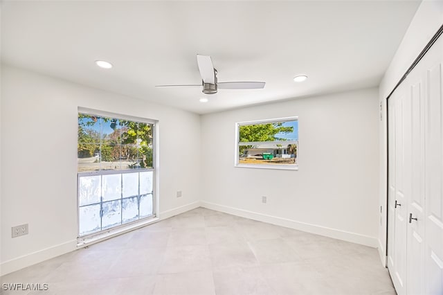 unfurnished bedroom featuring a closet and ceiling fan