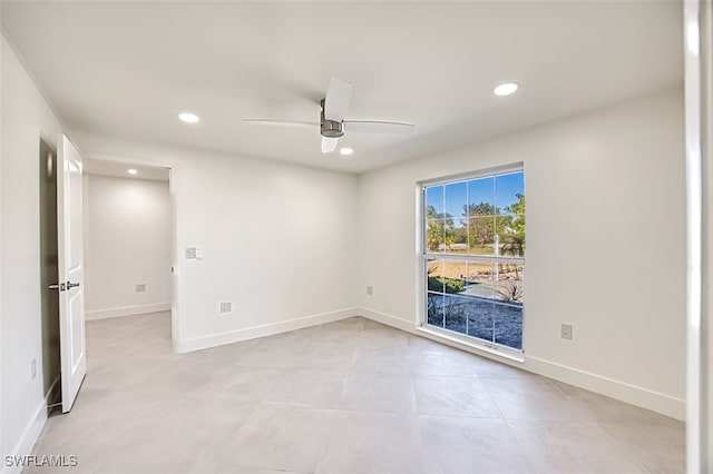 unfurnished room with ceiling fan