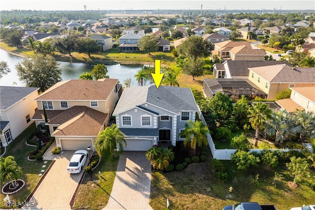 bird's eye view with a water view