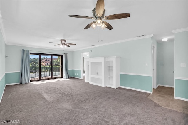 unfurnished living room featuring ornamental molding and carpet flooring