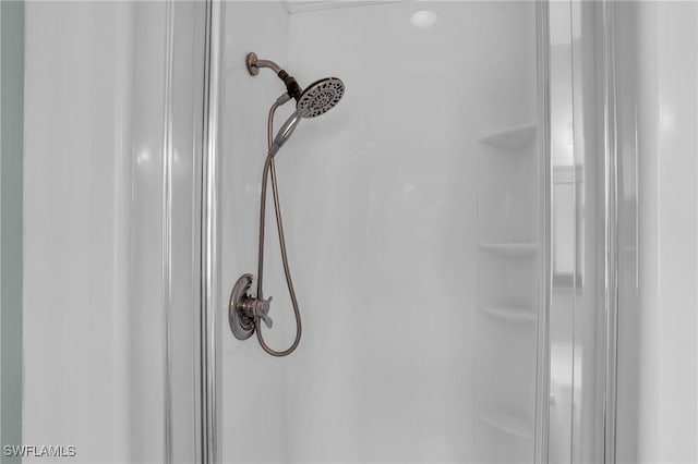 interior details with a shower