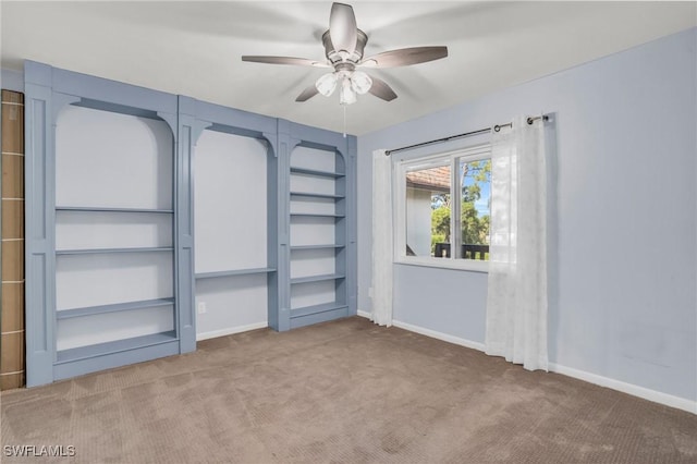 unfurnished bedroom featuring carpet floors and ceiling fan