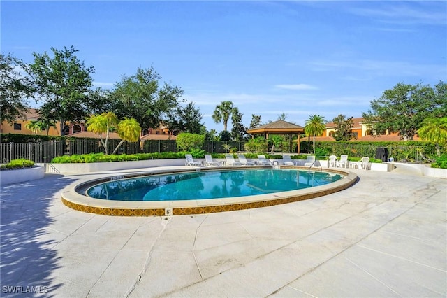 view of pool with a gazebo and a patio area